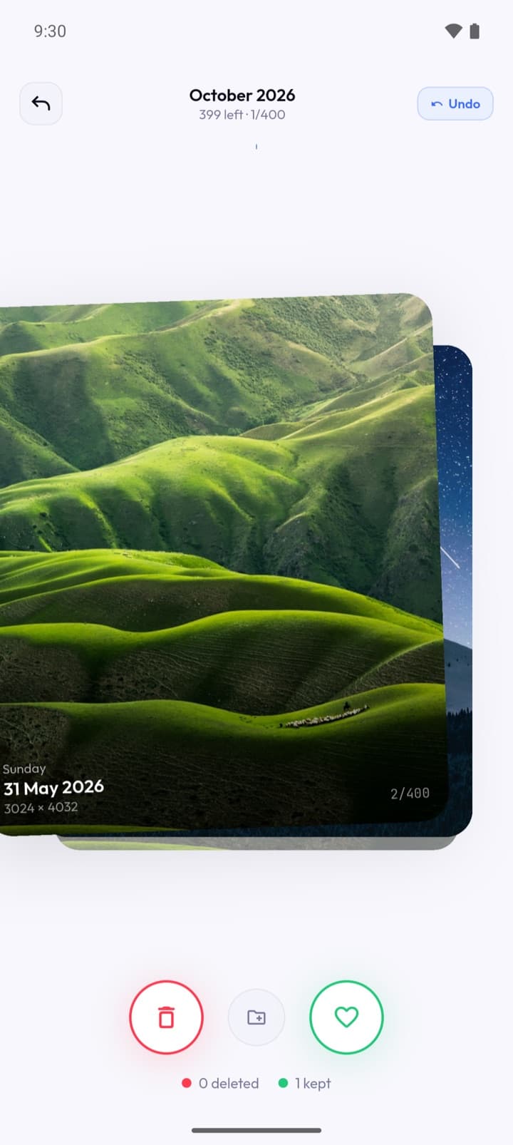 Declutter's swipe deck: one photo filling the card with the day, date and pixel dimensions on it, 399 left of 400, and delete, move and keep beneath — 0 deleted, 1 kept so far.
